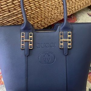 Beautiful designer bag. Has the Gucci logo, but is not authentic